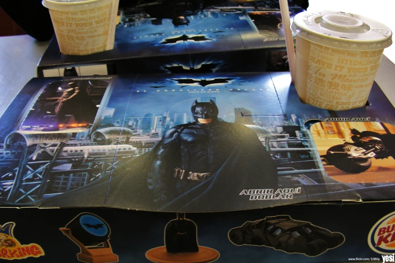 two batman coasters with ice cream on them