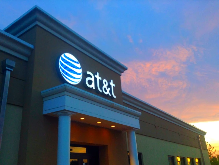 the exterior of a building with an at & t sign