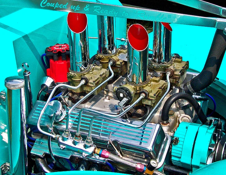 an engine is displayed on the blue car