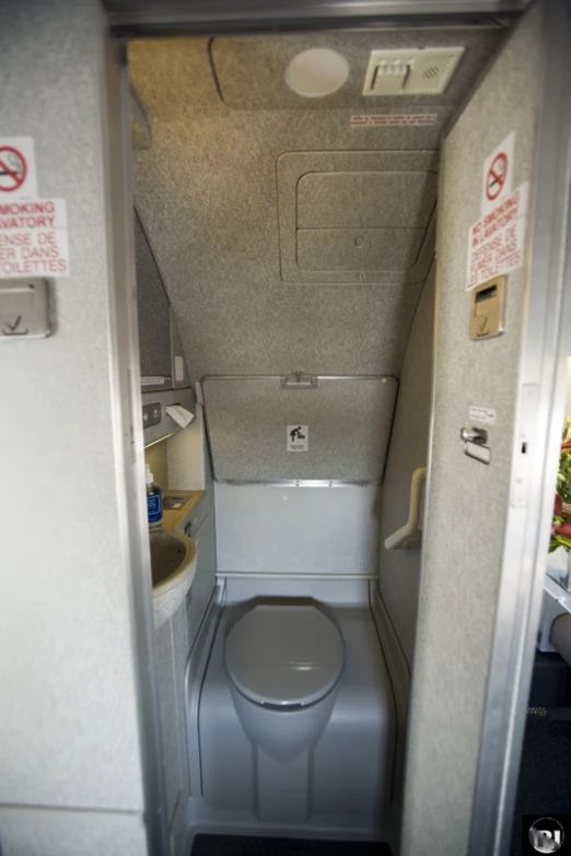 view of small toilet with no toilet seat