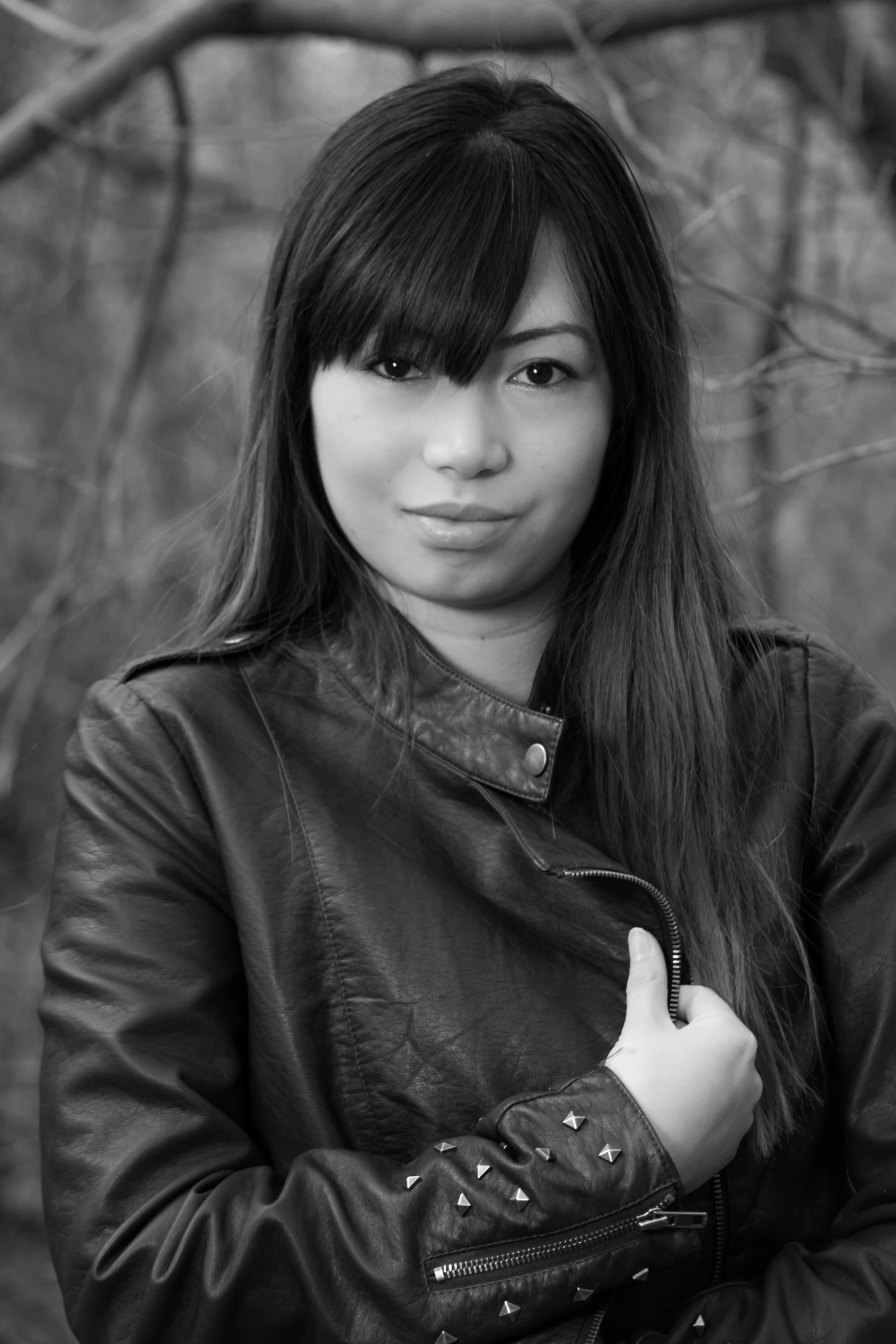 a young woman is posing for a portrait