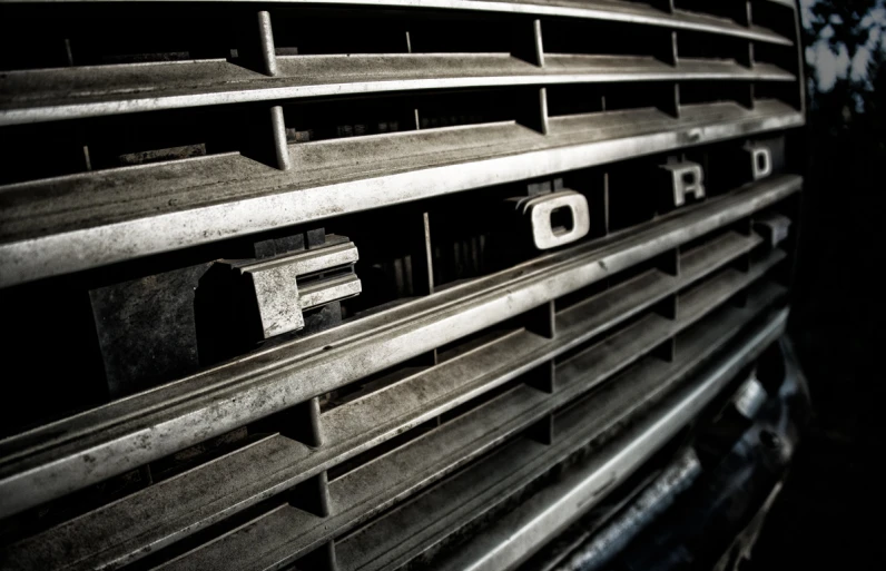 a close up of a grill on a truck