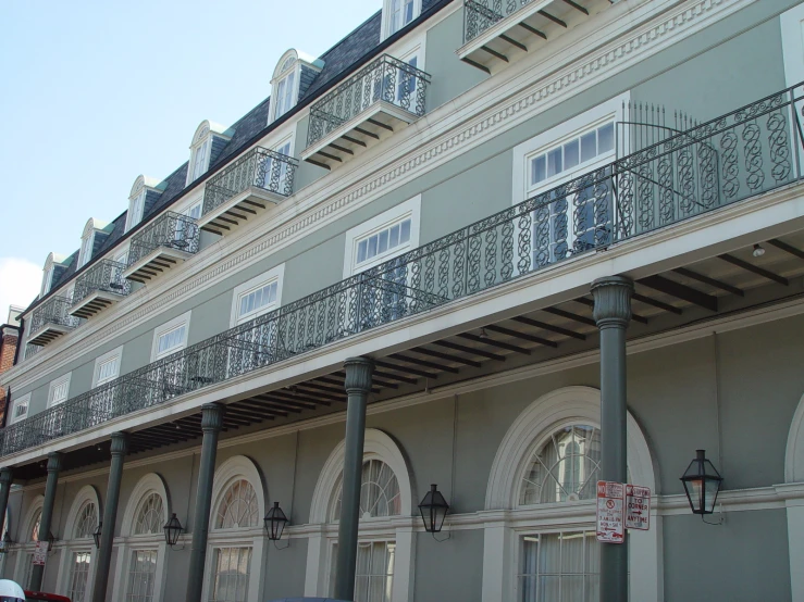 a car parked outside of an ornate building