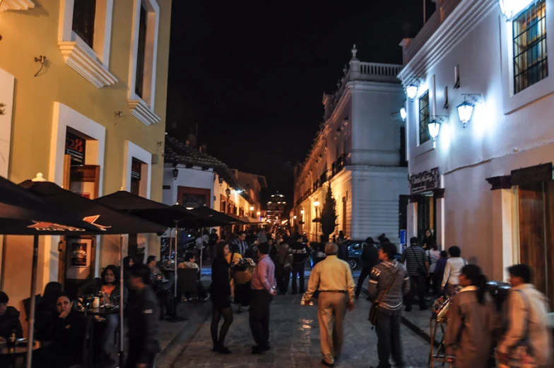 a busy street filled with pedestrians and people