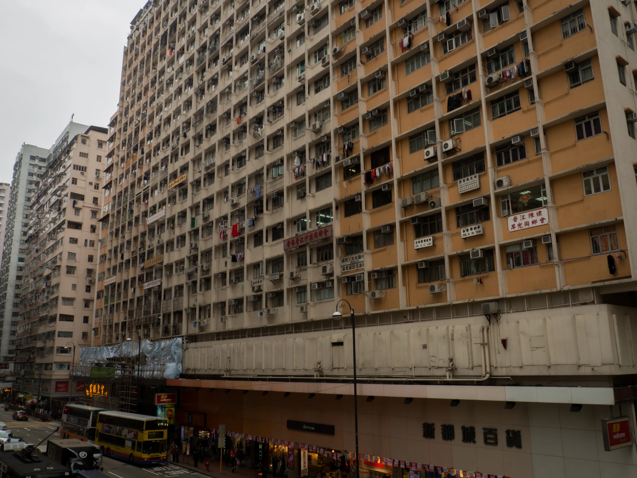 people gathered at the top of an open building