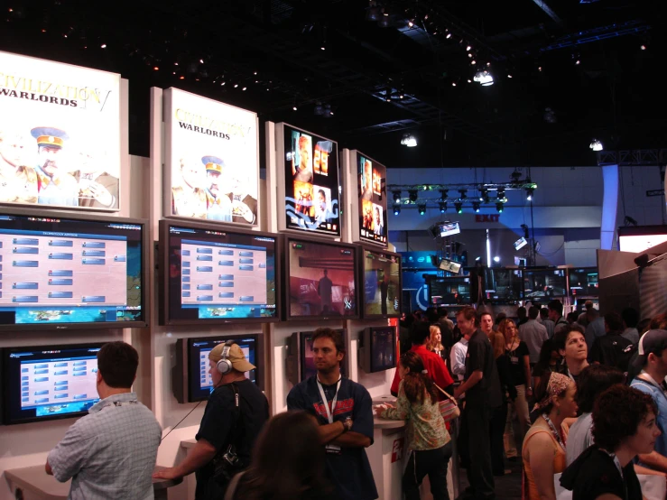 an image of a tv show room with people standing around