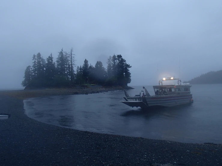 a ship coming out from the water in the rain