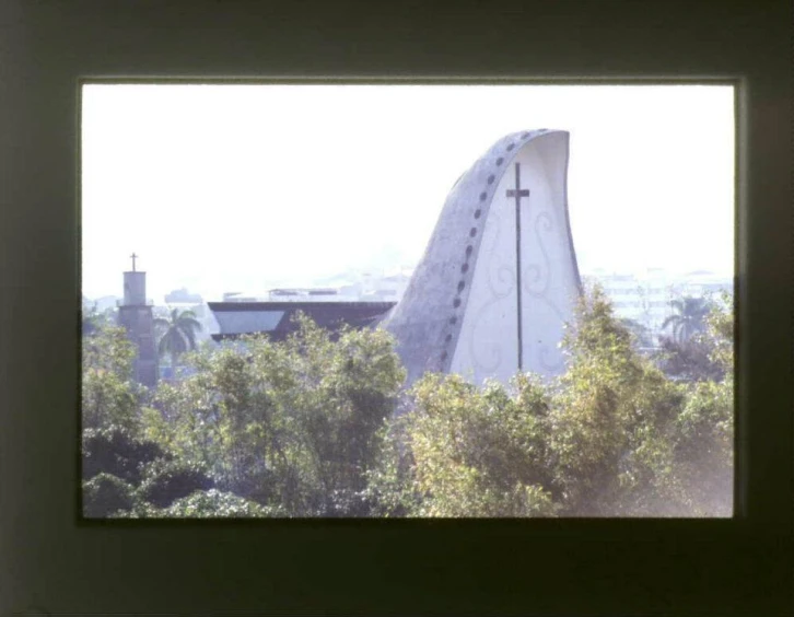 a building with a steeple on the side of it in the background