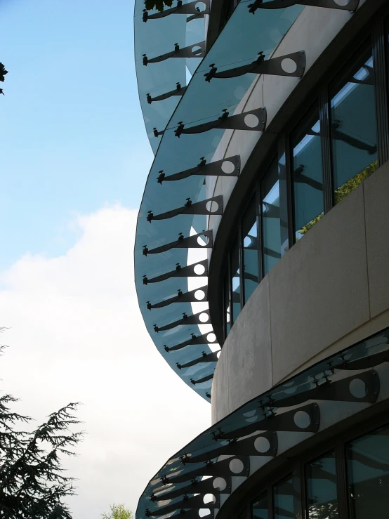 a building with circular windows and a circular clock in the center