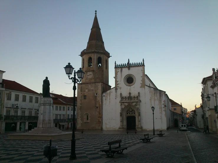 an old church with a very tall clock tower