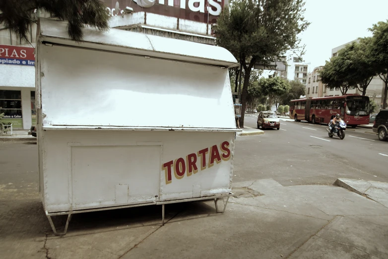 food truck advertising tortas on the side of the road