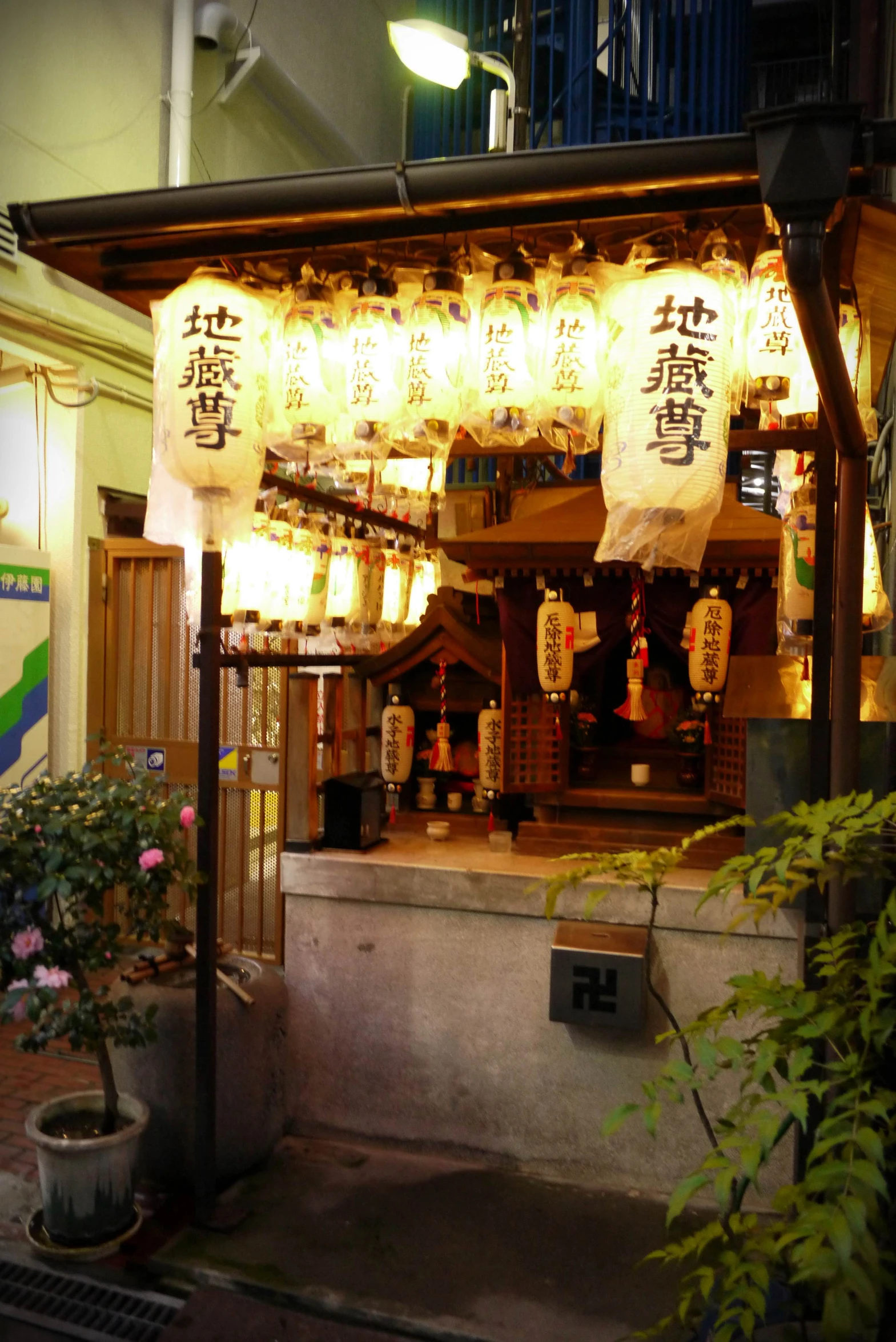 asian tea ceremony on the side of a road at night