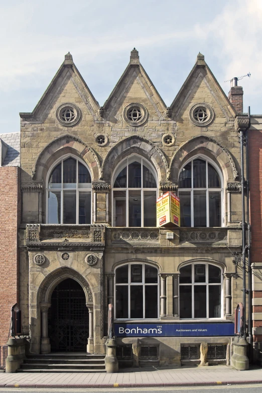 a building with a big sign that says friends