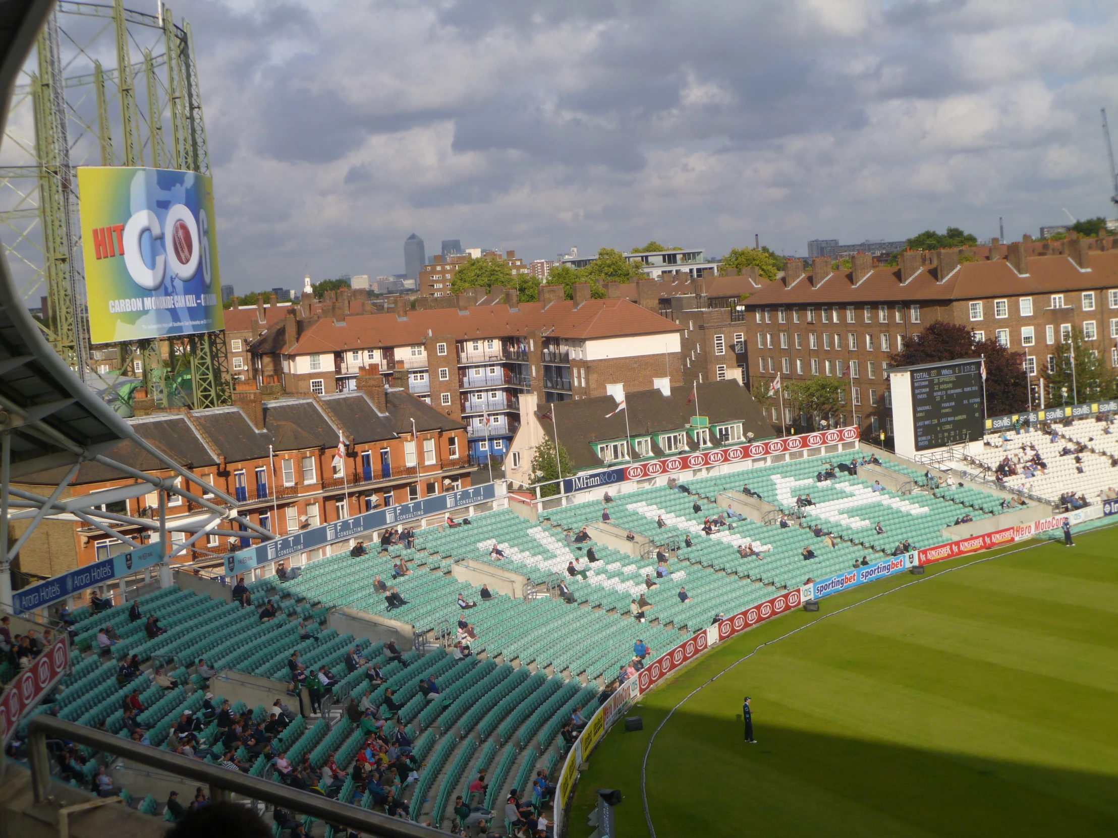 large sports stadium with full view of field and buildings