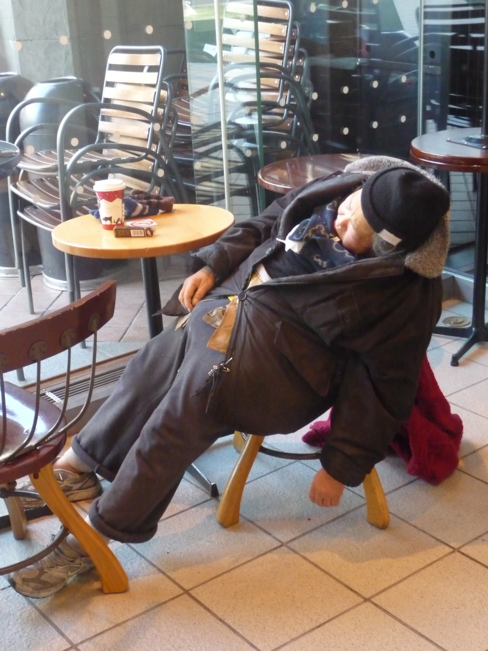 a man sitting in an office chair looking inside