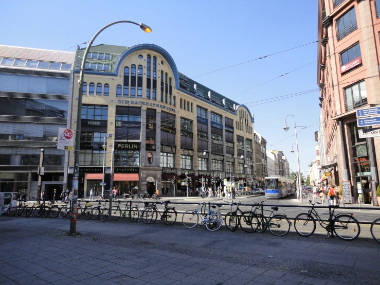 there is a view of a city street with buildings and people walking