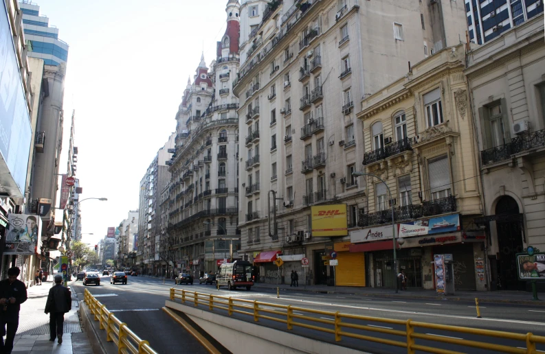 a tall building sitting on the side of a road