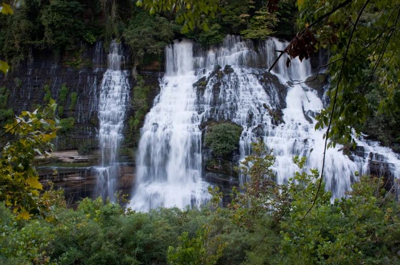 a waterfall with large waterfalls coming down from the side