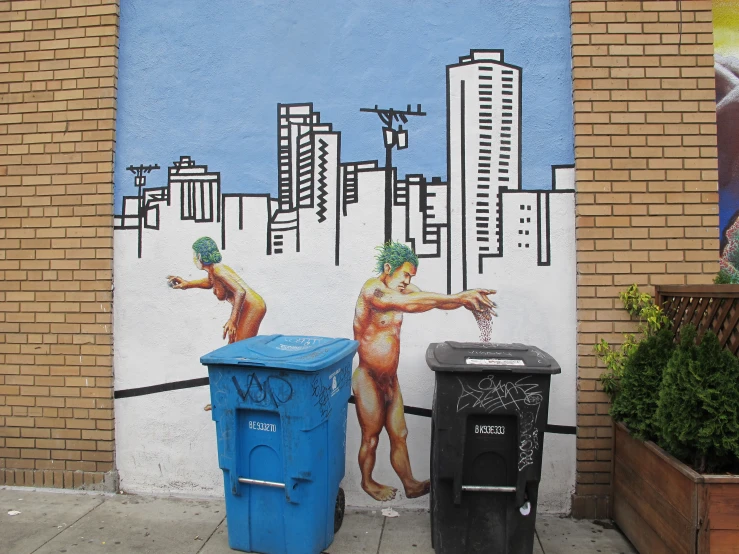 a mural on a wall shows two men spraying water