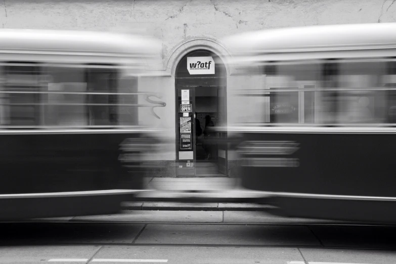 motion blur pograph of a bus pulling into a bus stop