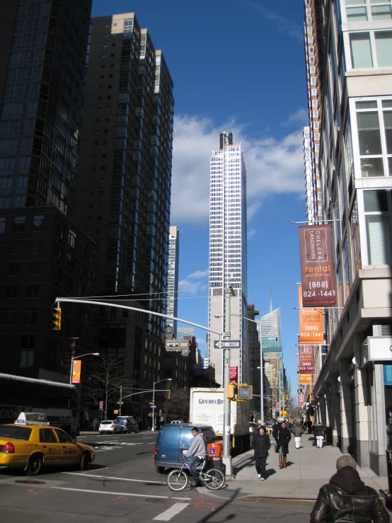 there is a busy street and pedestrian traffic