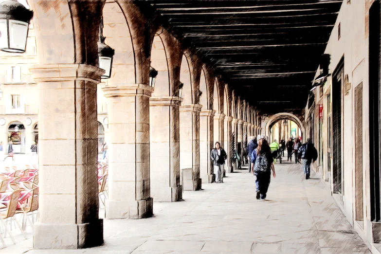 a group of people walking down a walkway between two tall columns