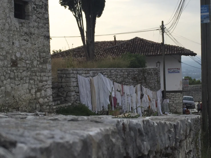 there are clothes hanging on the clothes line