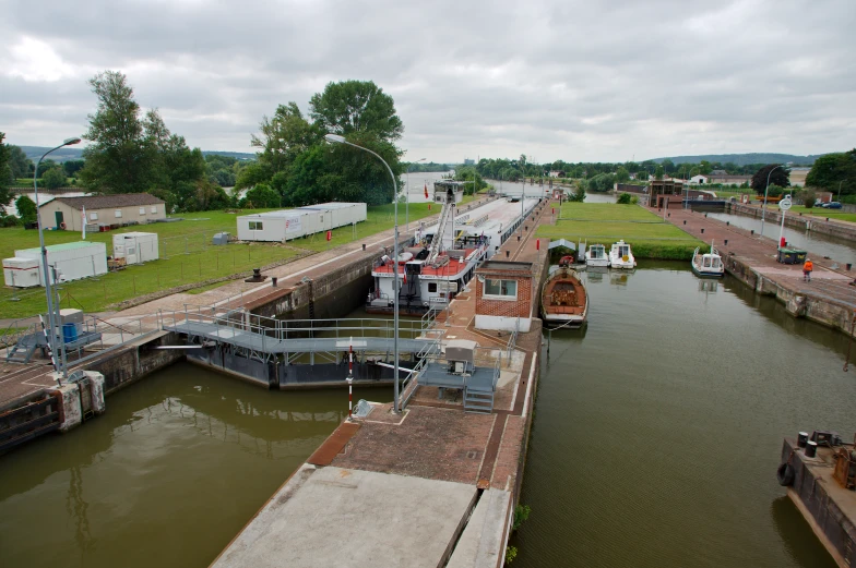 an aerial view of a boat dock at the river