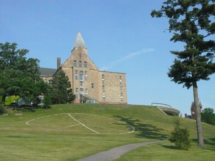 a large building on the top of a hill
