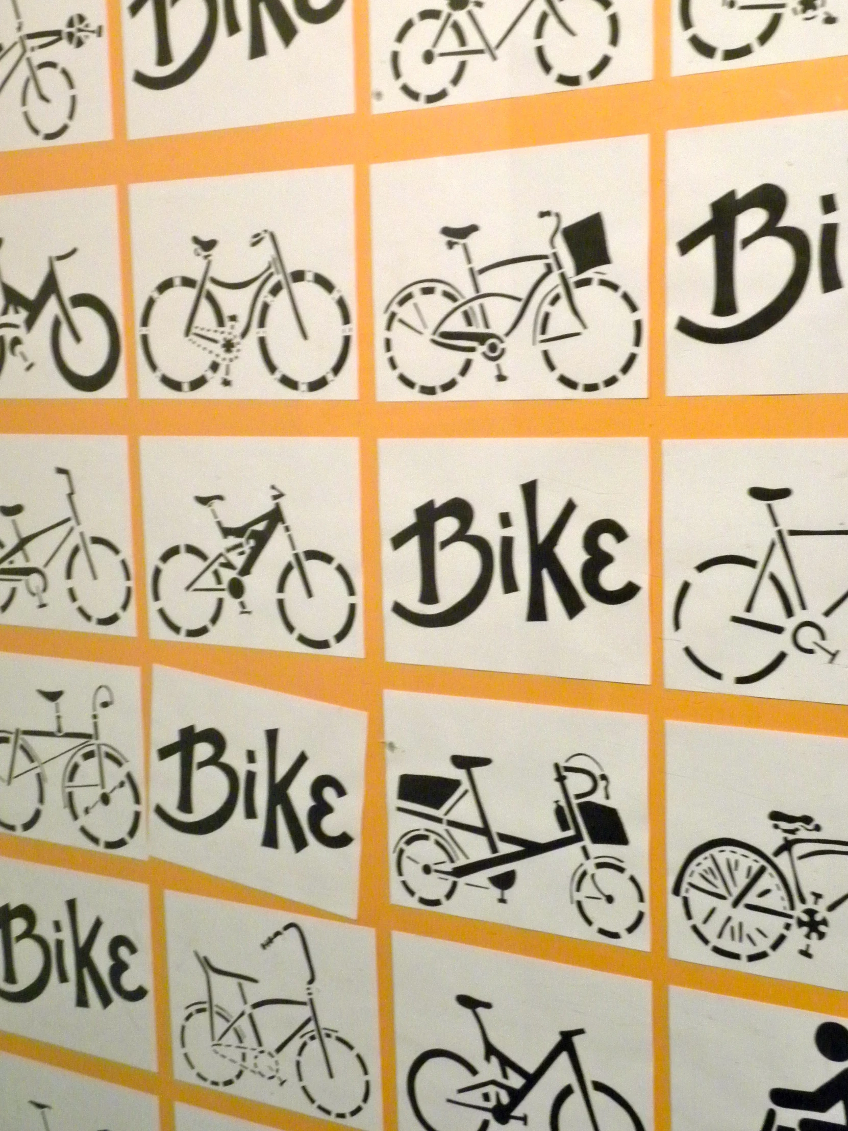 a close up of some bicycles on the wall