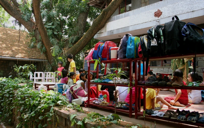 a shop with a variety of products in front of it