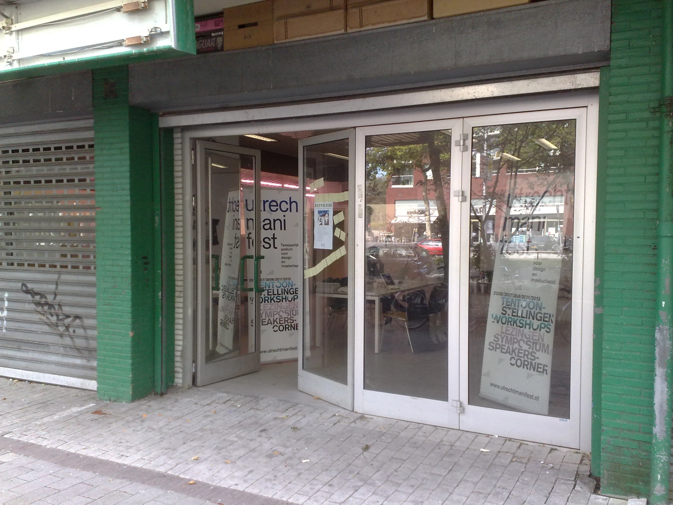 the front door of a building with the windows closed