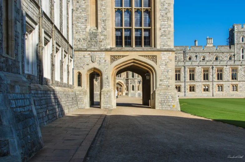 a large brown building has a big doorway