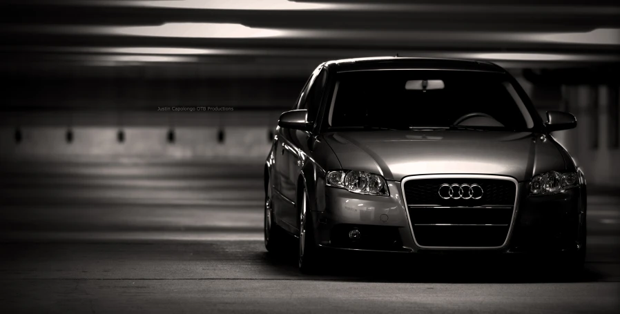 the silver audi in black and white pograph