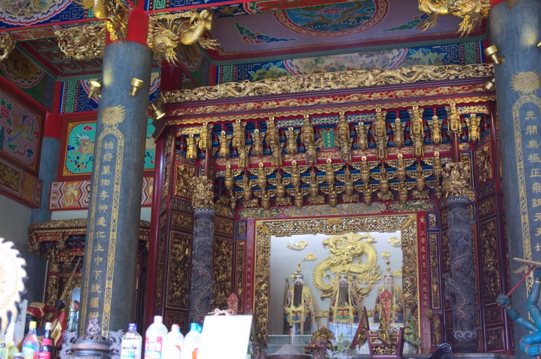 the interior of an oriental temple with a large door