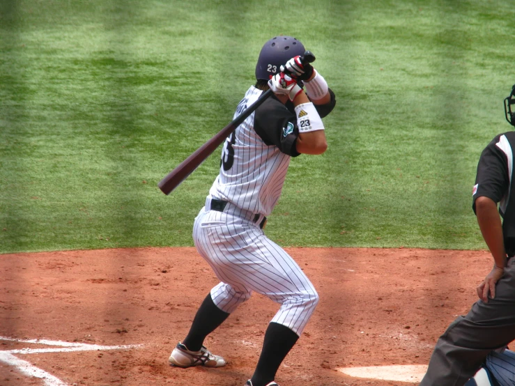 the batter looks toward the catcher during a baseball game