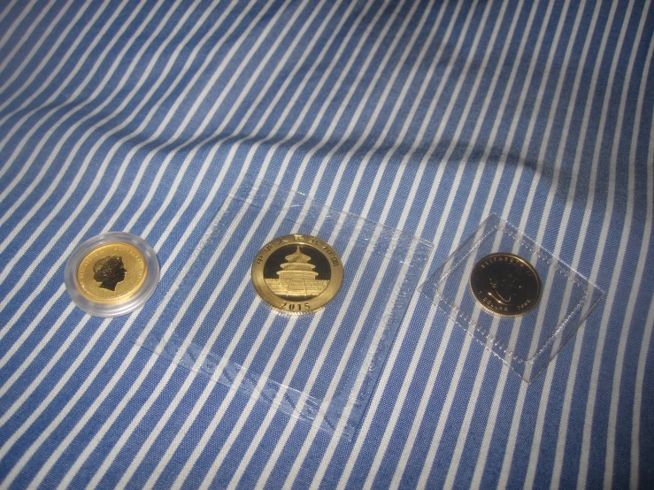 two small metal ons sit in a pocket