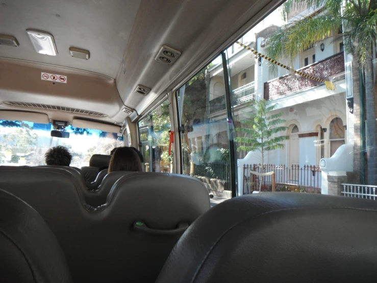 the view inside the vehicle from the back seat