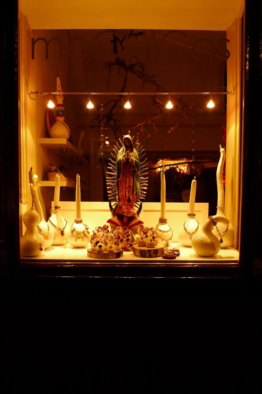 a store display window filled with glass objects