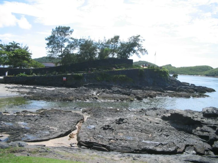 there is a house on top of the rocks