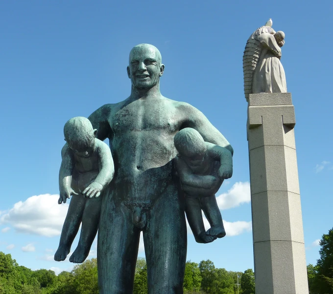 this is the statue of a man holding an angel