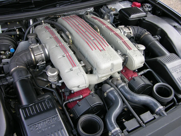 a car engine with its new turbo pipes and other accessories