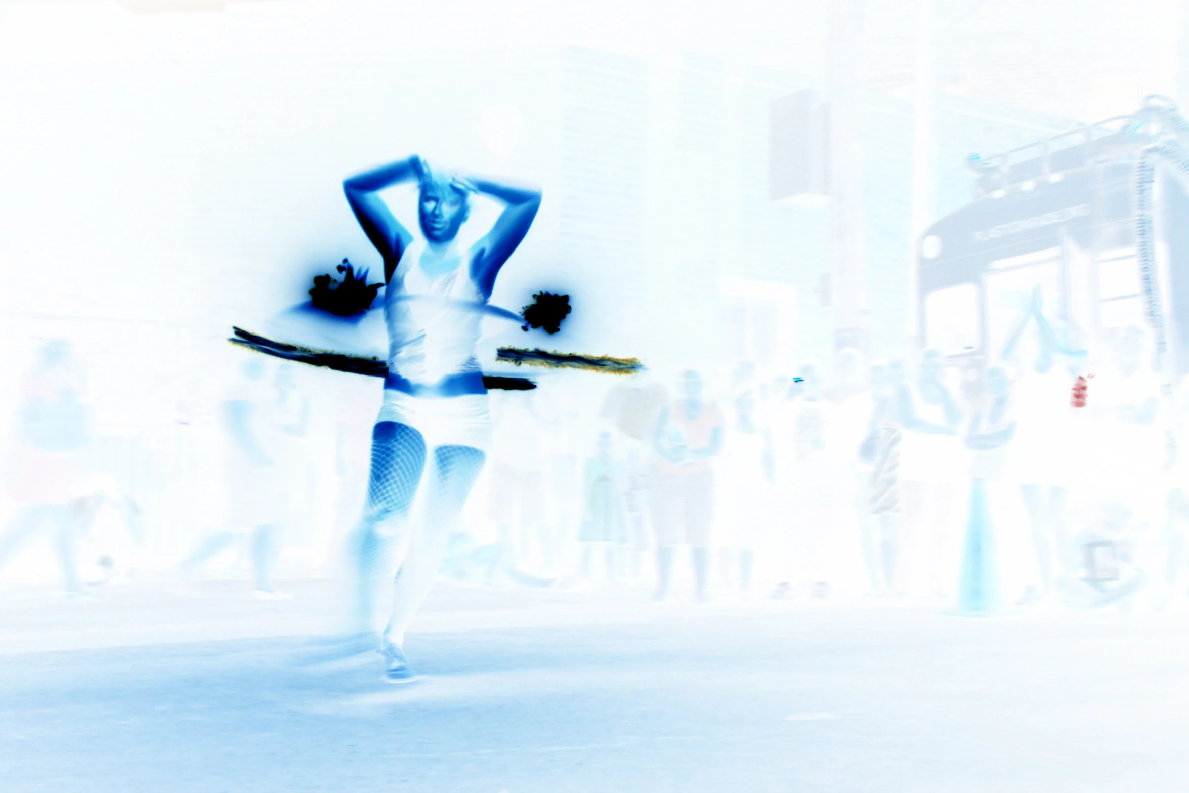 a man running while holding onto some sort of stick