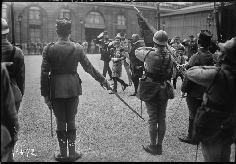 soldiers with their rifles and weapon are watching soldiers walk in uniform