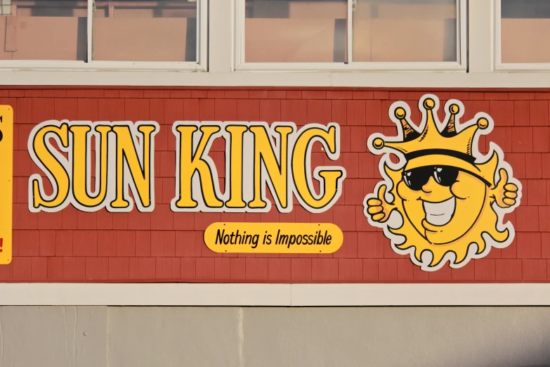 a restaurant called sun king on the side of a building