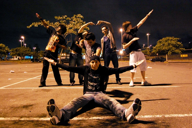 the group of young men are posing for a po