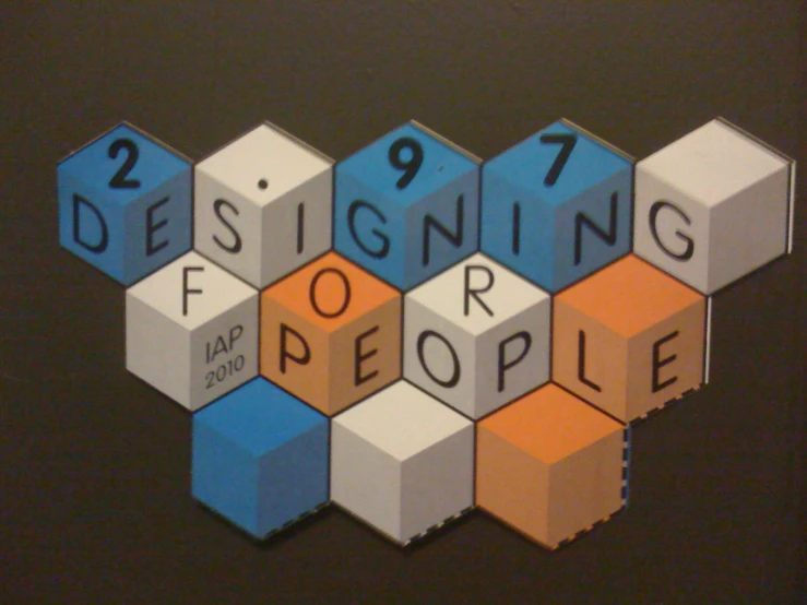 an artistic poster with the words designing for people