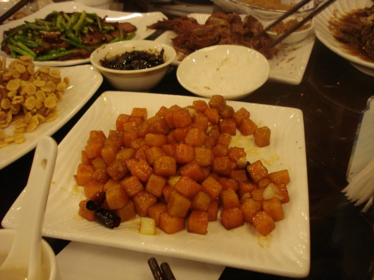 a large meal set up on a dining room table