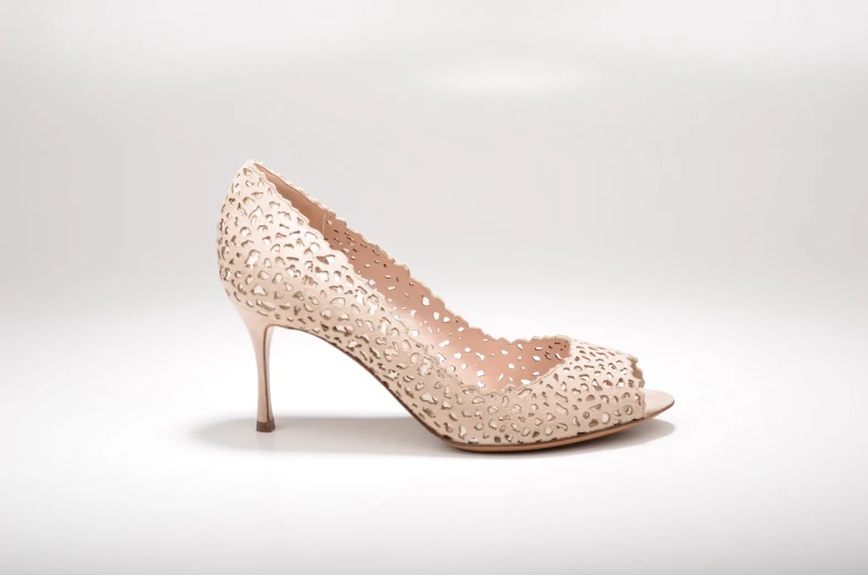 the heel of the high heels is covered in white lace