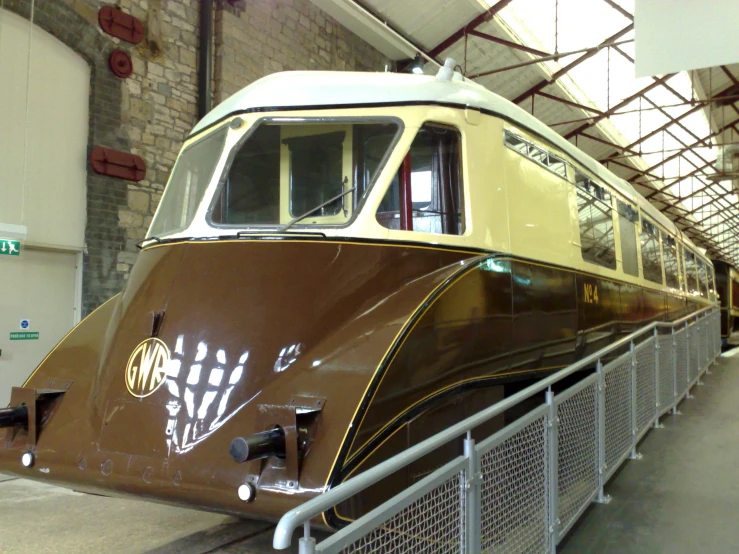 a passenger train parked in a train station